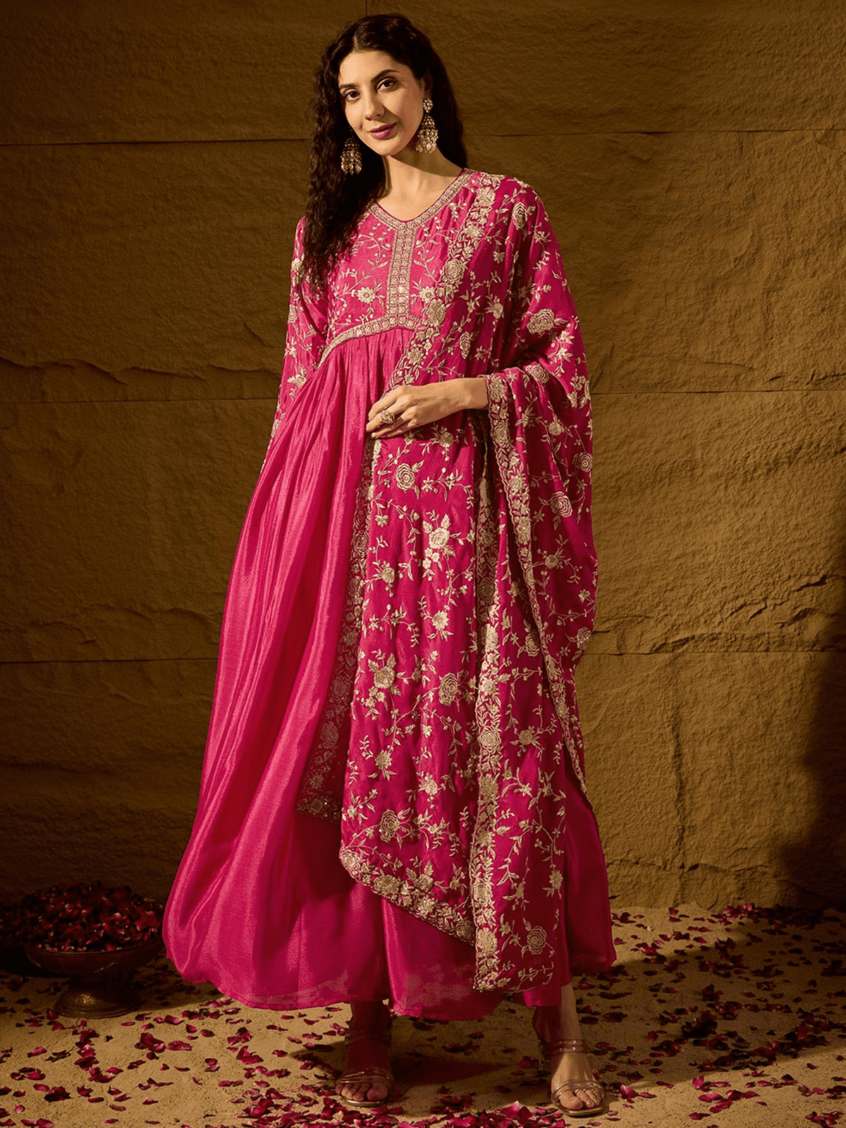 Aromie embroidered anarkali gown with dupatta in vibrant pink, featuring intricate floral patterns and flowy design.