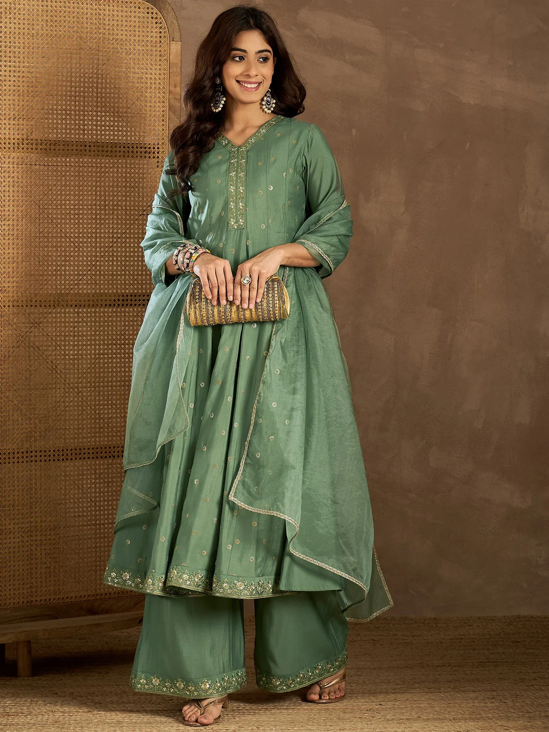 Aromie embroidered Anarkali Kurta in green fabric with intricate detailing, perfect for weddings in Canada.