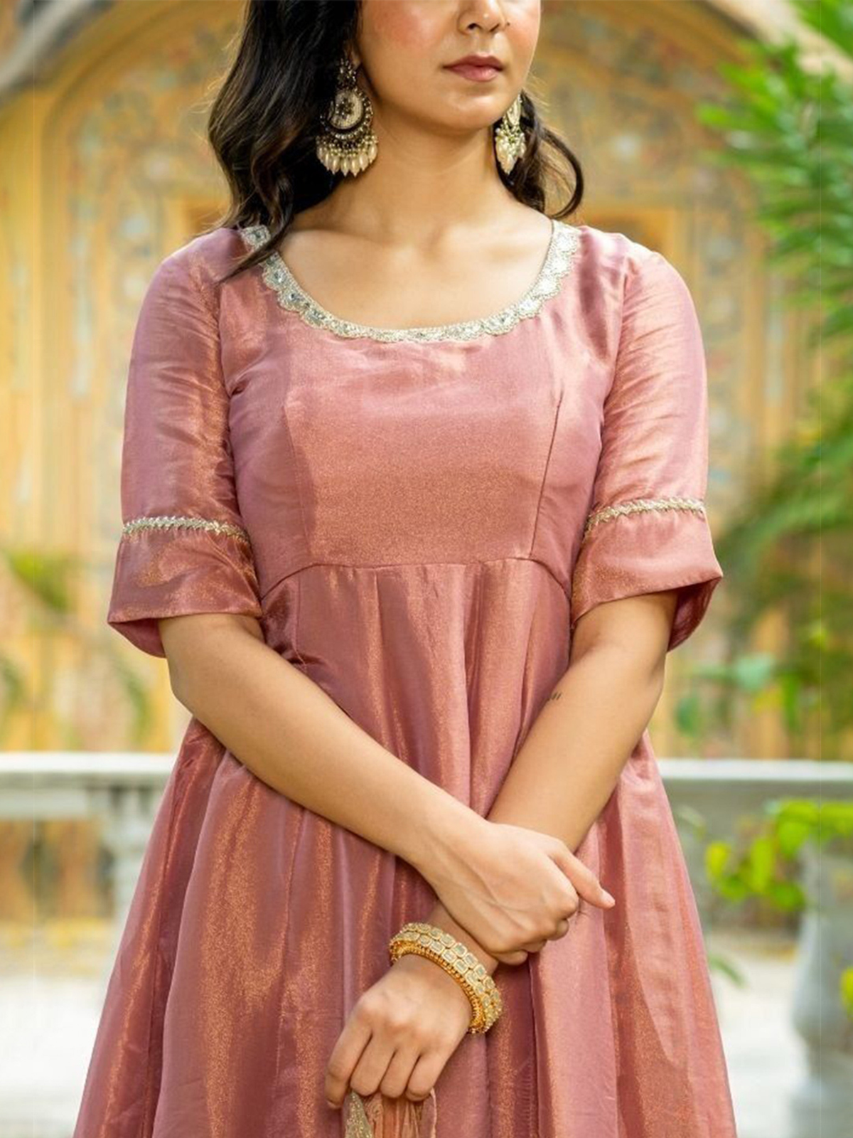 Elegant Embroidered Anarkali kurta set Canada in soft pink with intricate detailing and bell sleeves.