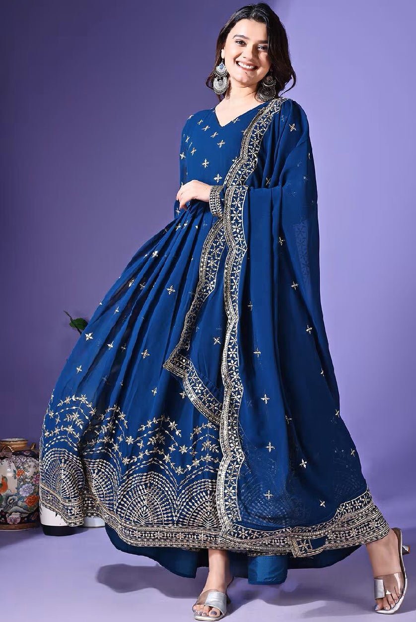 Elegant blue Embroidered Anarkali Kurta Set with intricate designs and flowing fabric for festive occasions