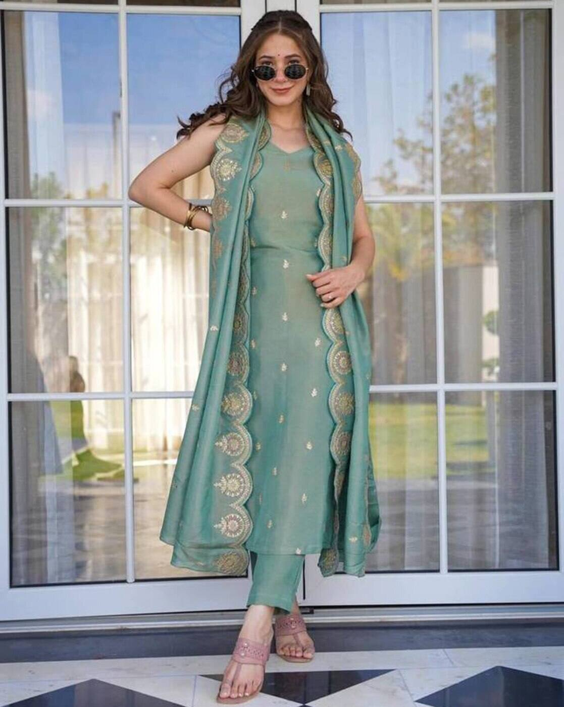Aromie embroidered Anarkali kurta set in soft green with intricate golden embroidery three piece kurtha