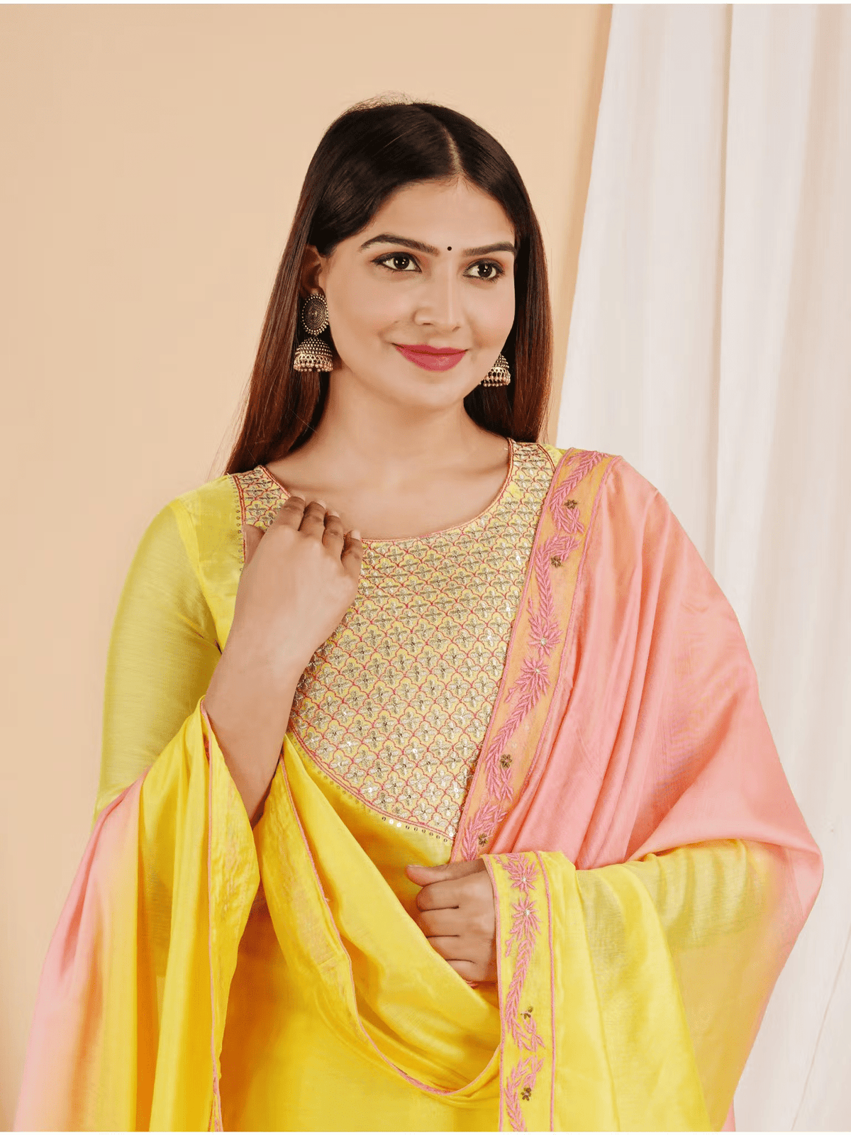 Aromie embroidered Chanderi kurta set in yellow with intricate embroidery and a pink dupatta for festive occasions