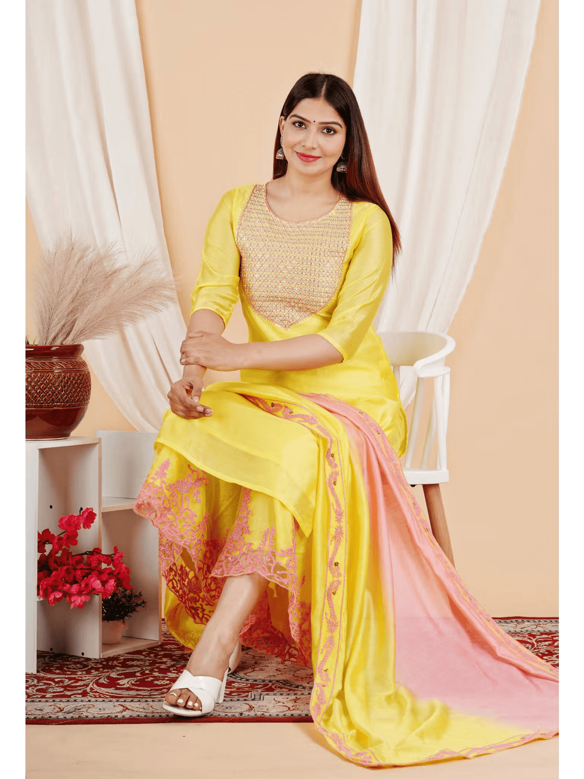 Embroidered Chanderi kurta set in yellow with pink accents, featuring intricate designs and elegant styling