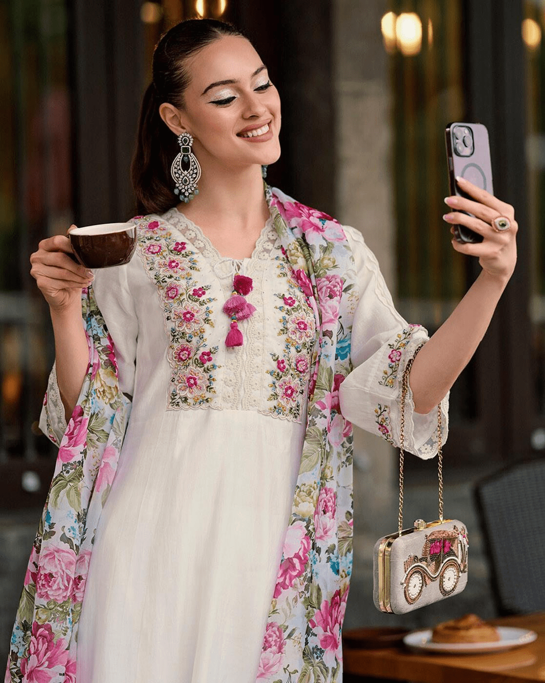 Aromie three piece embroidered cotton kurta set with floral design, paired with a matching dupatta and stylish accessories