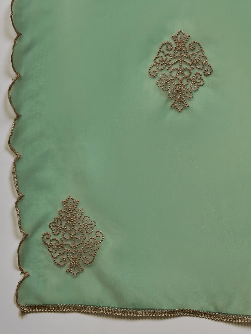 Embroidered dress set Canada in green with intricate gold detailing on the fabric edges