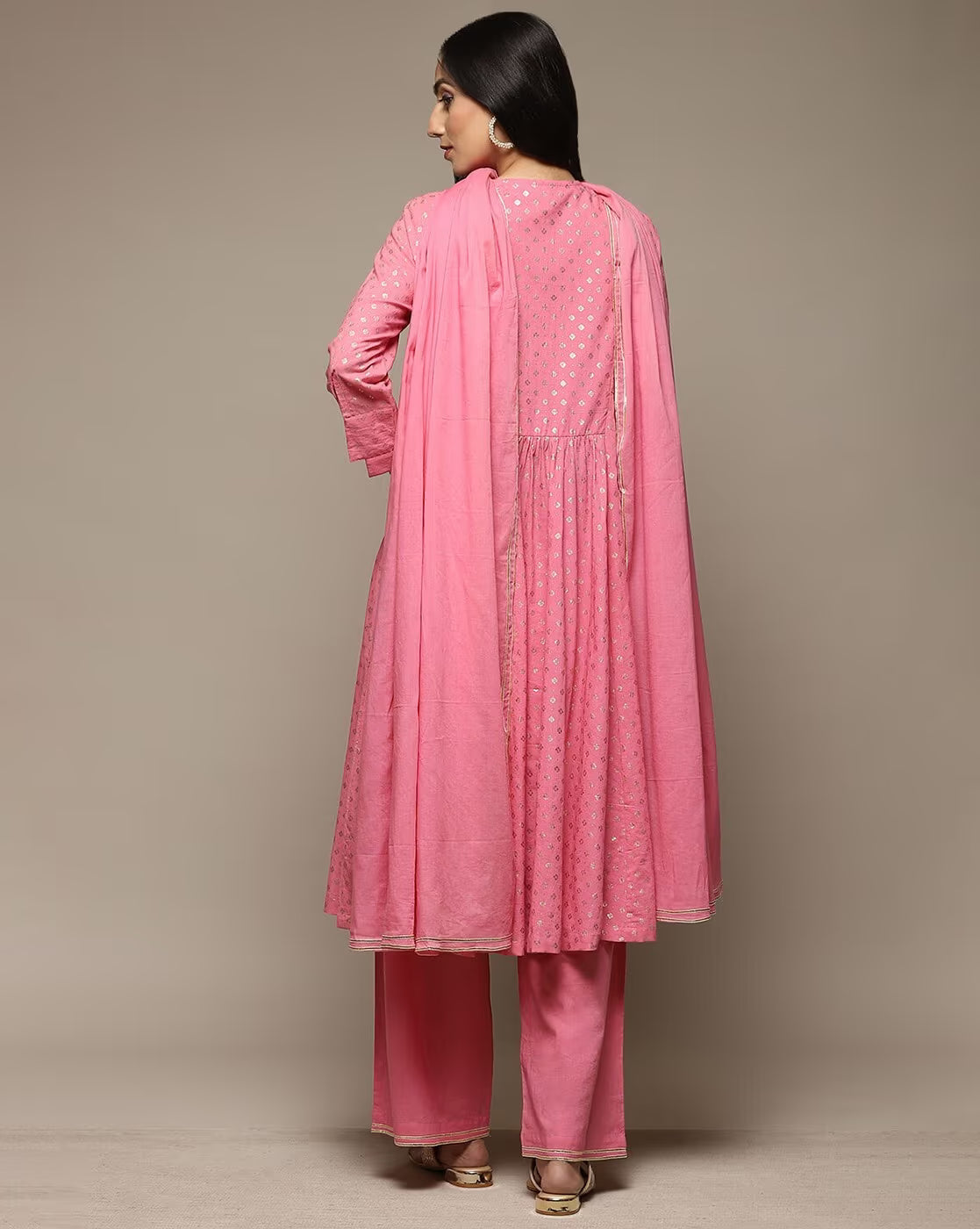 Back view of an embroidered flared kurta set Canada in pink with a matching dupatta and pants