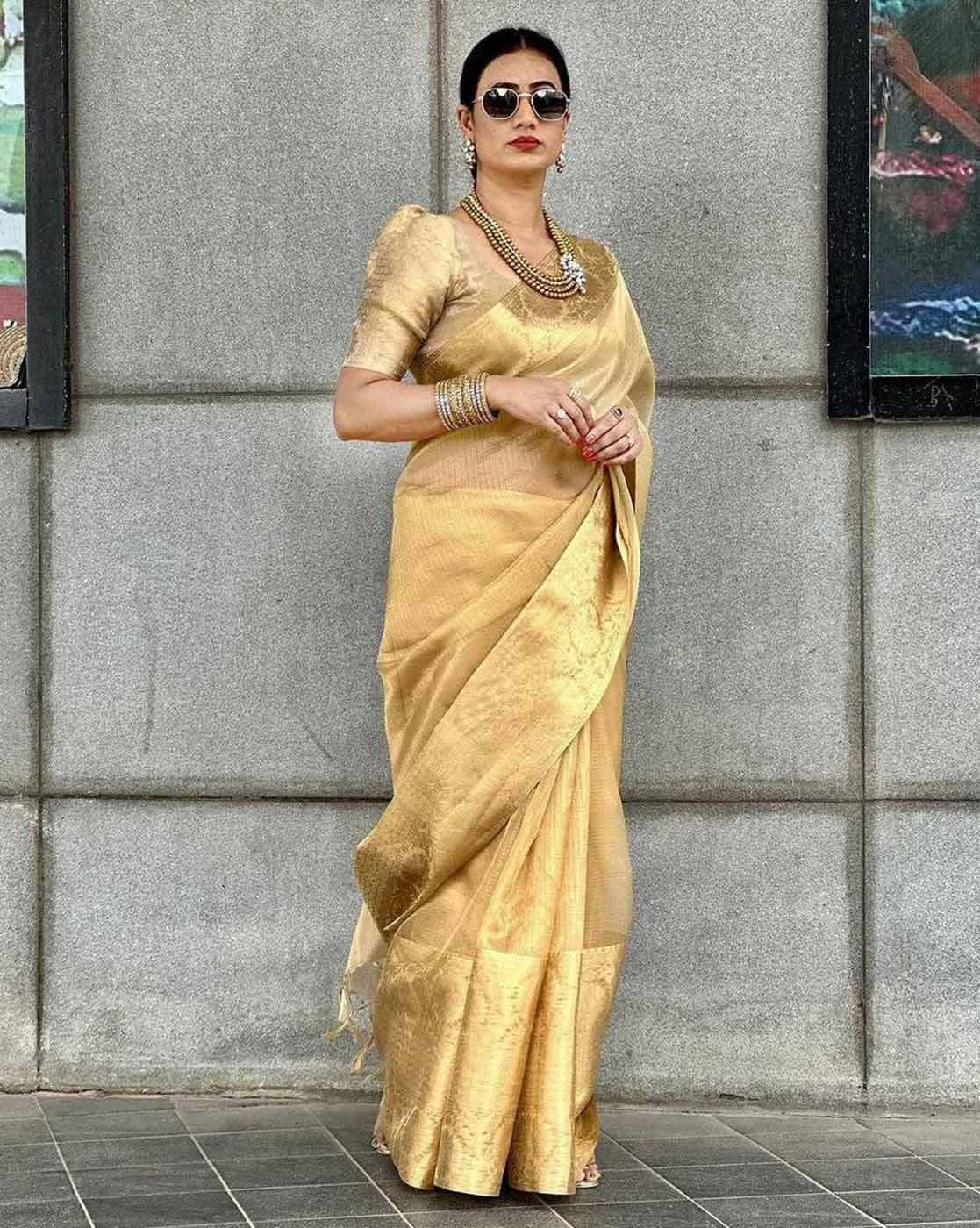 Elegant Embroidered Gota Tissue Saree Canada in gold with intricate designs and stylish draping