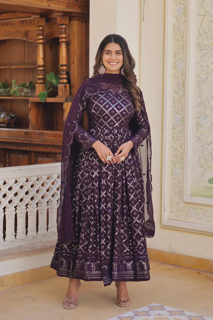 Purple three piece Kurtha with intricate embroidery, paired with dupatta, perfect for festive occasions