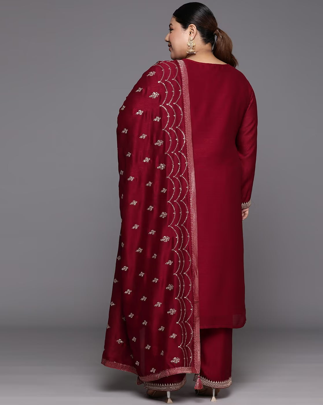 Back view of a three piece maroon Embroidered Kurta Set for Women by Aromie featuring intricate embroidery