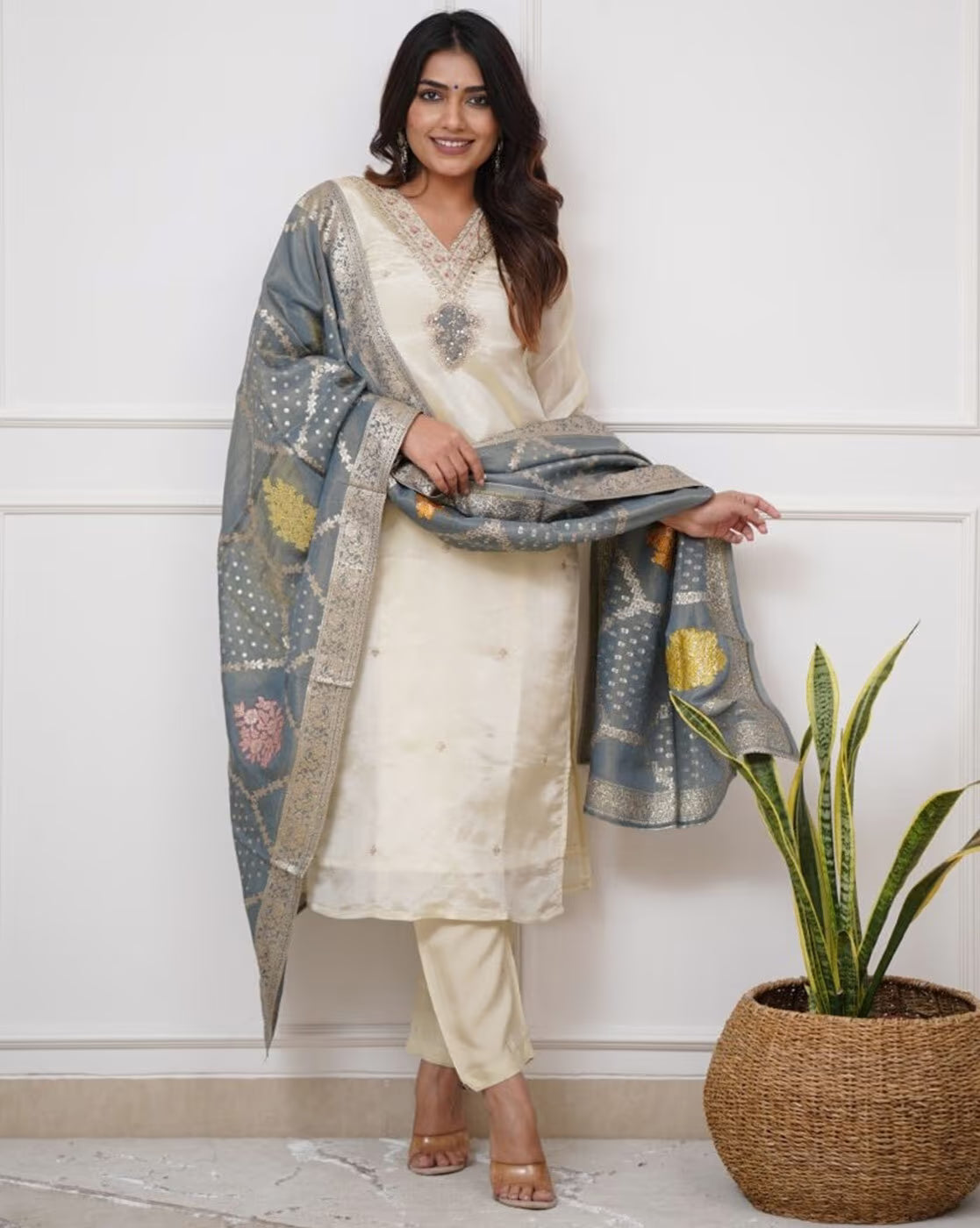 Elegant three piece embroidered kurta set for women with a stylish dupatta and slim pants