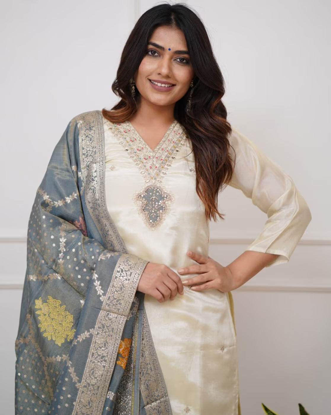 Elegant three piece embroidered kurta set for women featuring intricate design and stylish dupatta