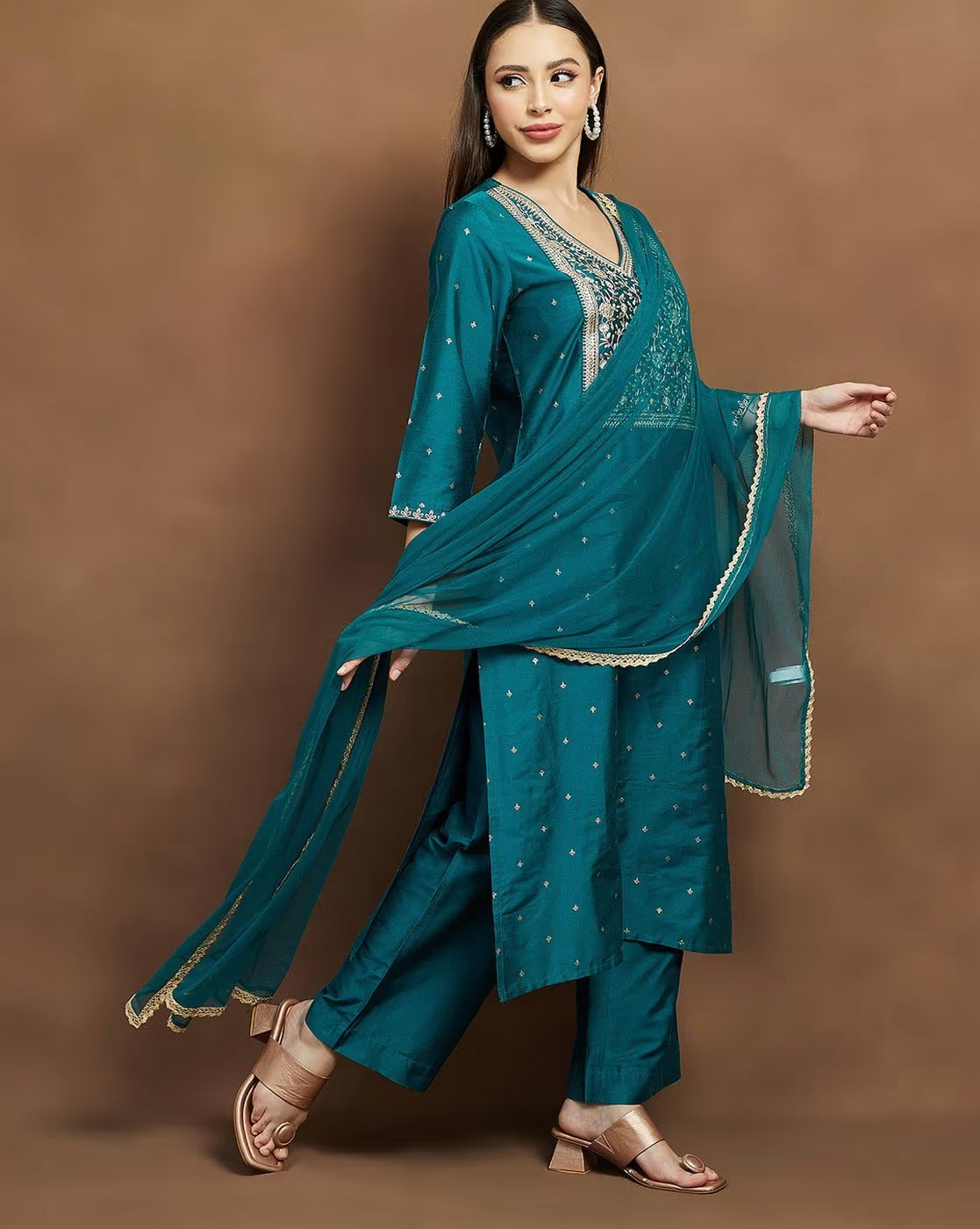 Stylish embroidered kurta suit set for women in teal with elegant detailing and a matching dupatta