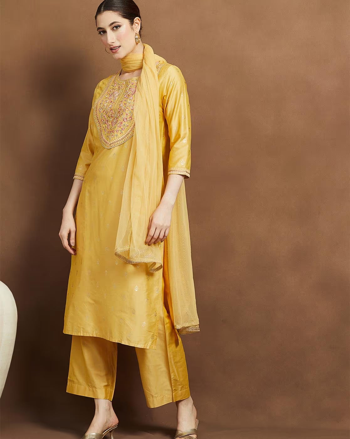 Embroidered kurta suit set for women in yellow with elegant detailing and matching dupatta