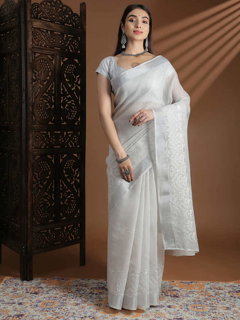 Elegant white embroidered Saree in lightweight fabric, perfect for weddings and formal occasions, front view