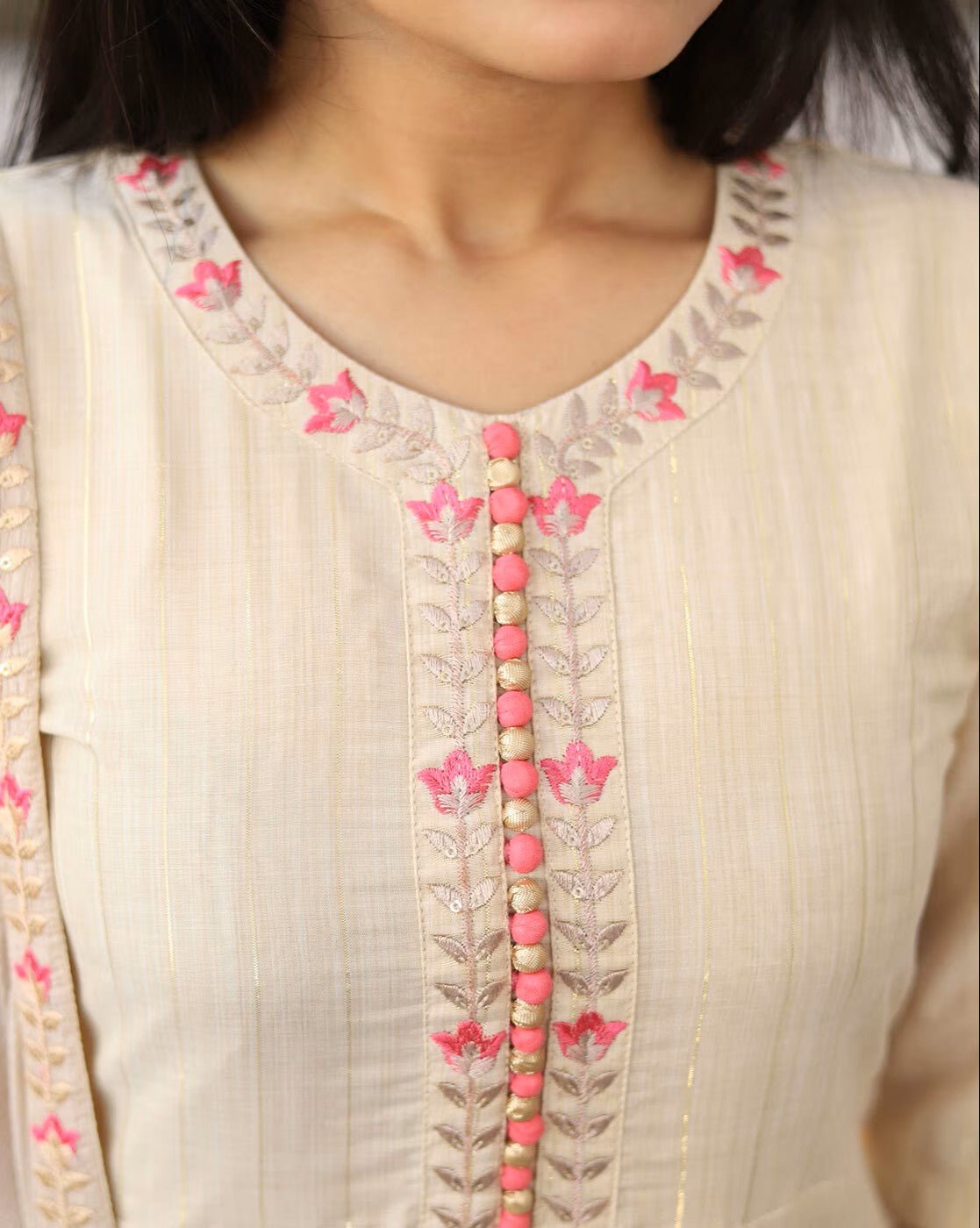 Embroidered Silk Anarkali Kurta Set with intricate floral design and button detailing in soft colors