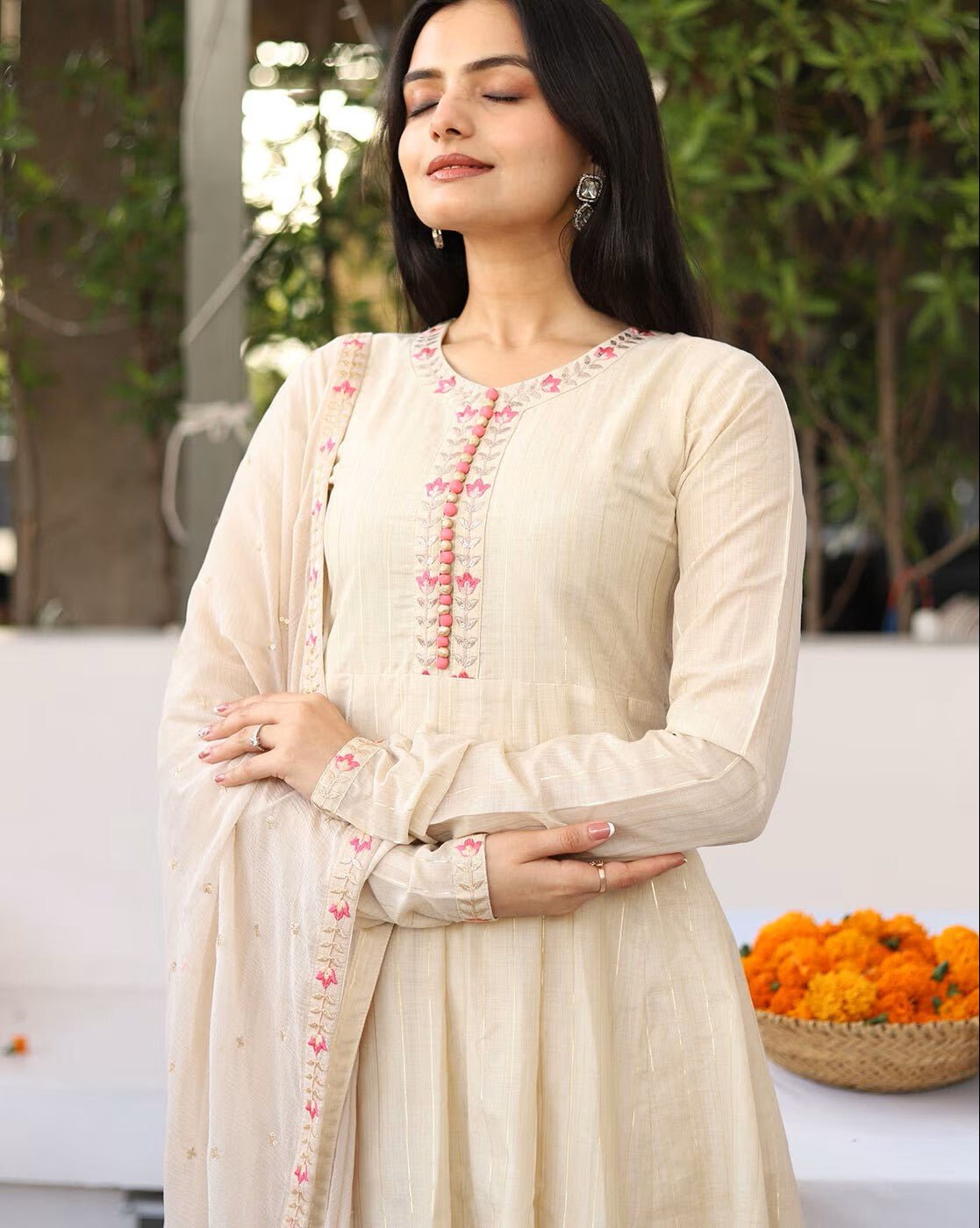 Elegant Embroidered Silk Anarkali Kurta Set in cream color with detailed embroidery and a matching dupatta