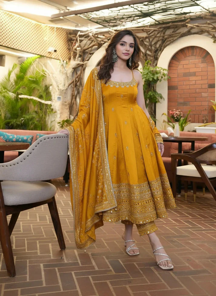 Aromie embroidered vichitra silk kurta set in bright yellow with intricate designs and elegant flow