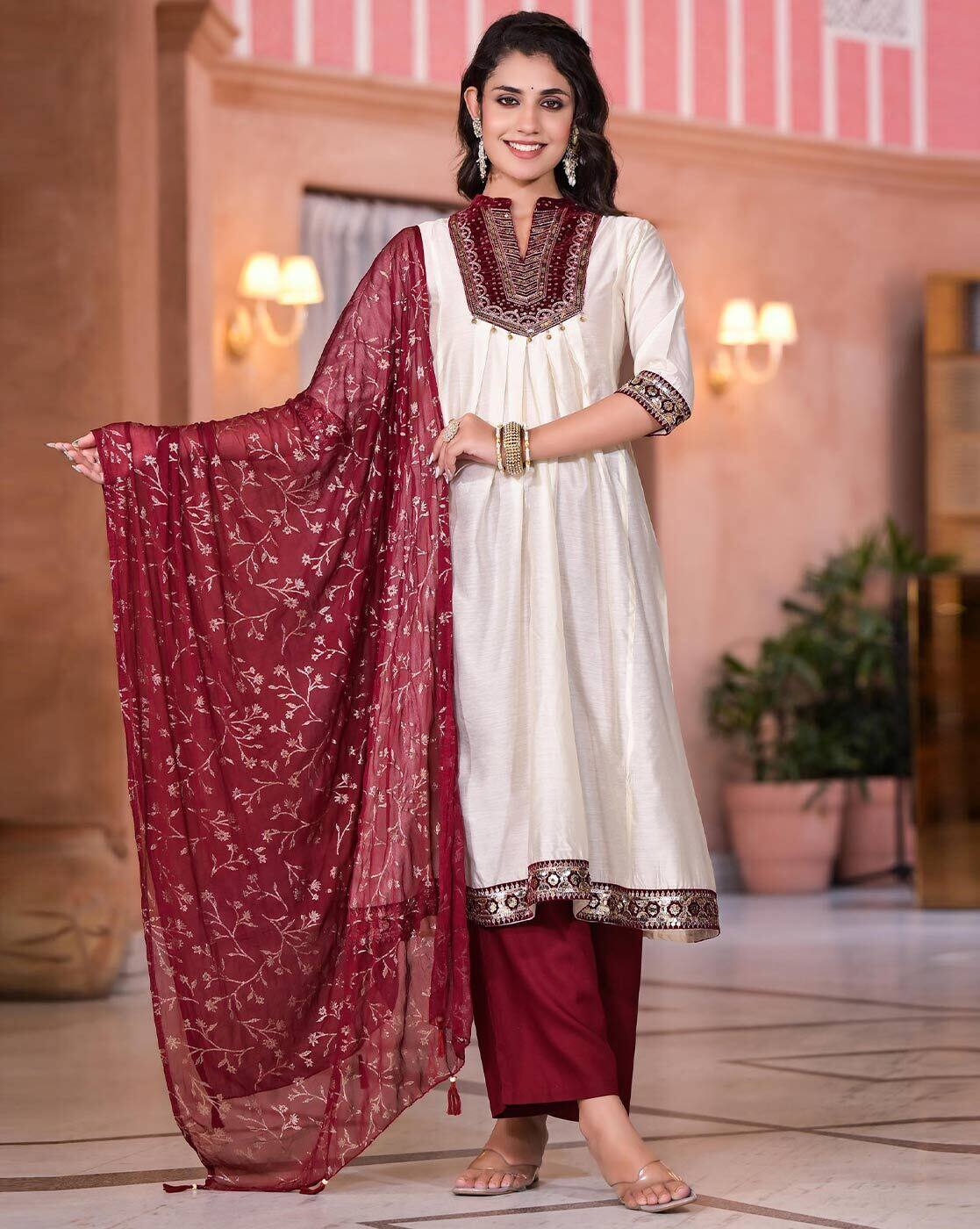 Aromie three piece set featuring women's floral cotton kurta in ivory with maroon embroidery matching pants and dupatta