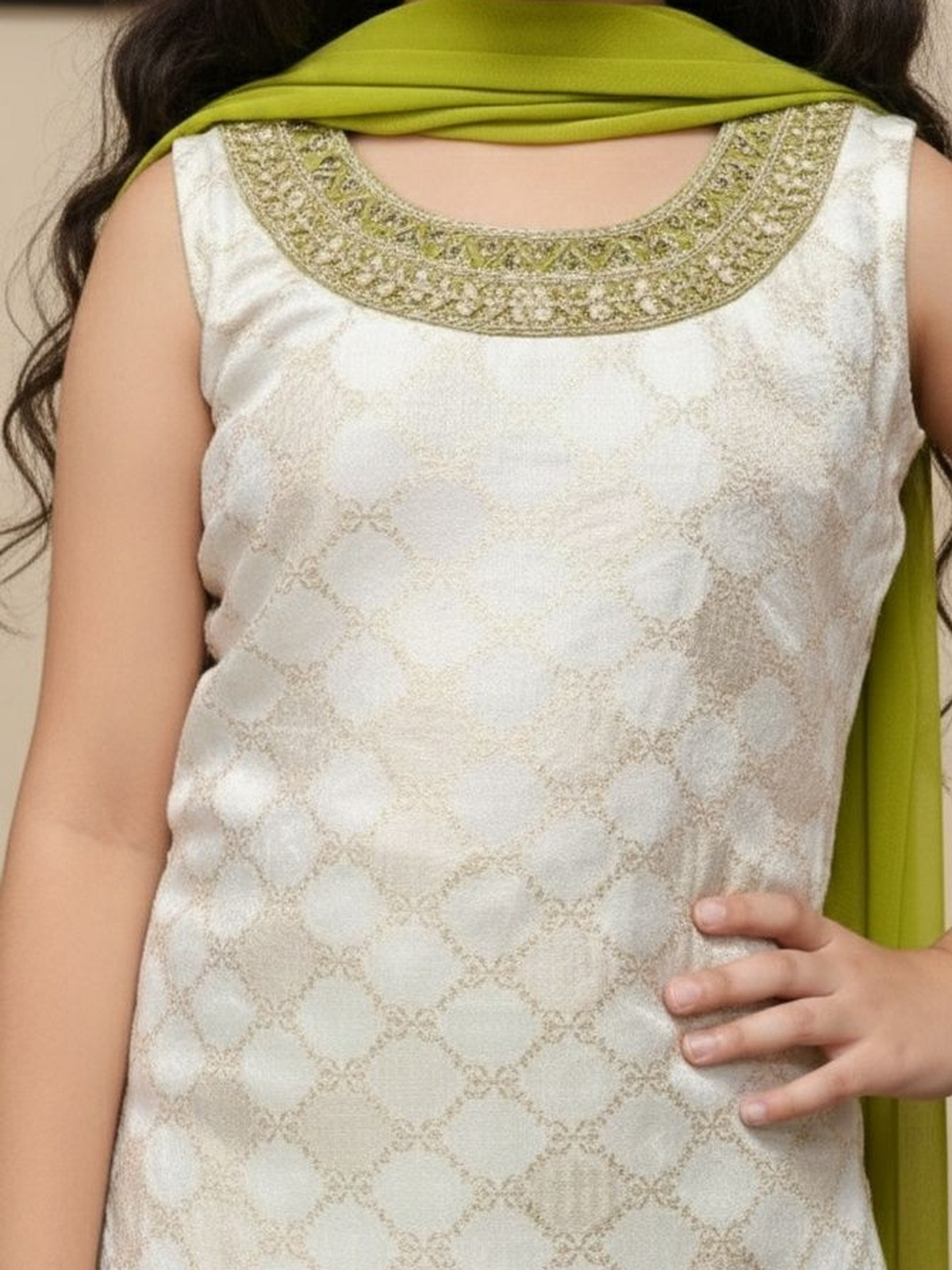 Front view of Aromie Girls Ethnic Kurta Set for Girls Canada in cream with intricate green embroidery, perfect for festive occasions.