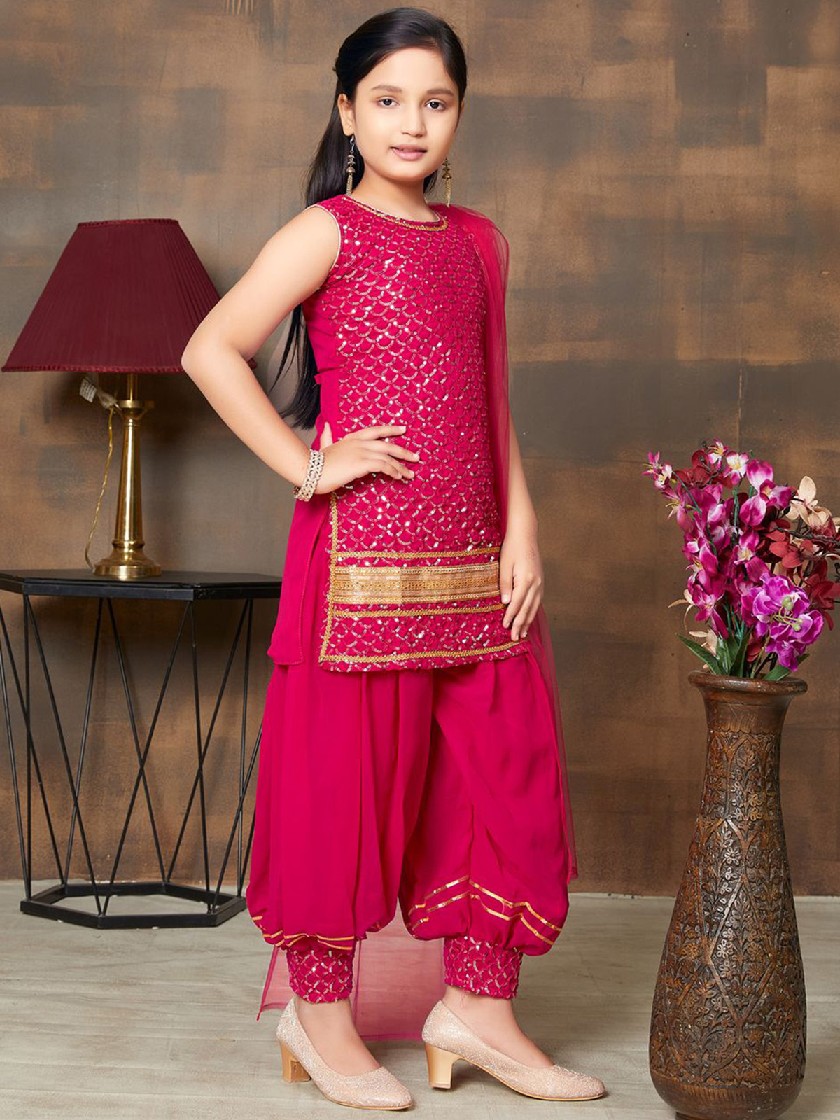 Girls ethnic kurta set in vibrant pink with intricate embroidery, perfect for festive occasions in the USA.