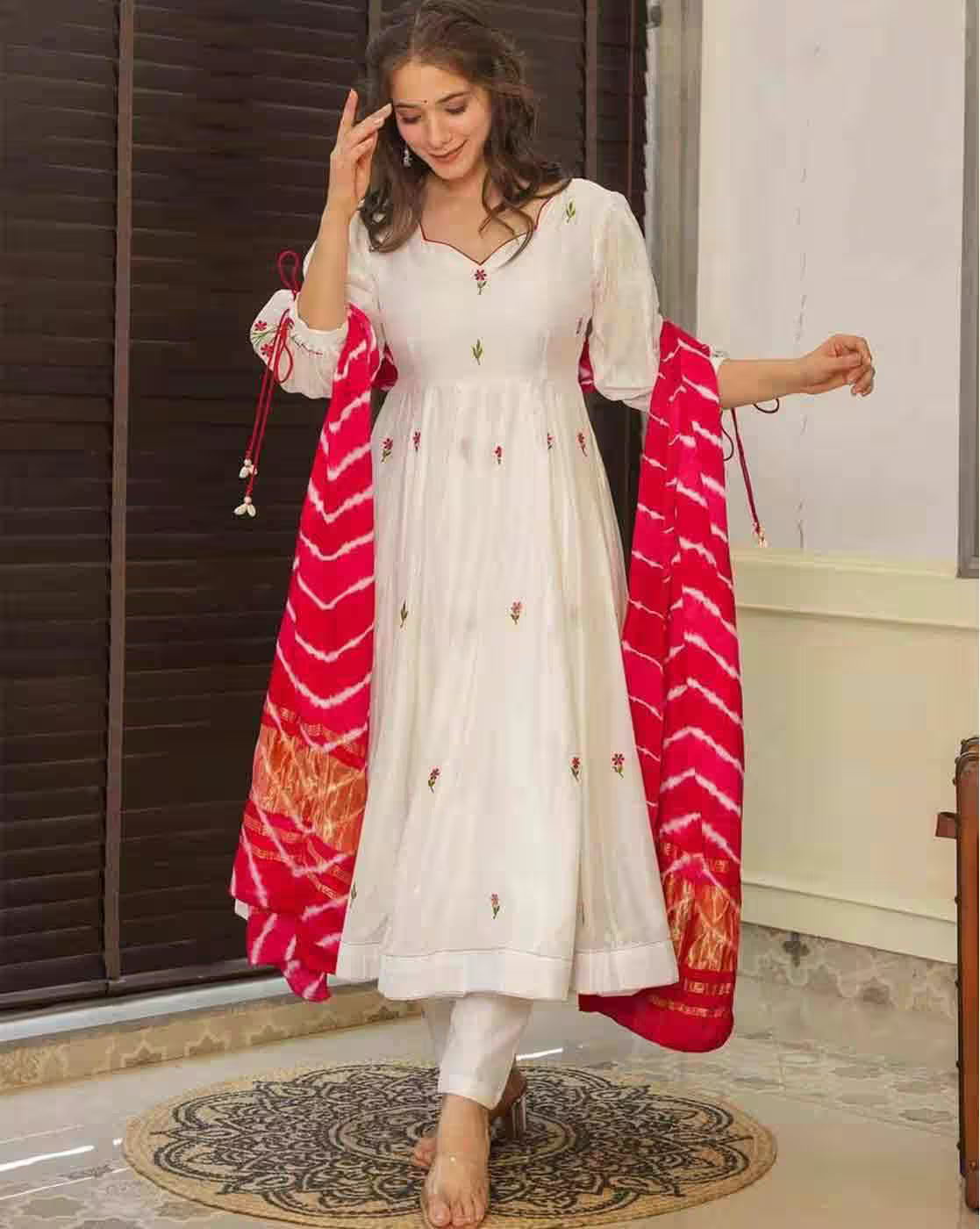 Aromie white embroidered ankle length kurta with red bandhani dupatta and churidar floral cotton kurta set for festive wear