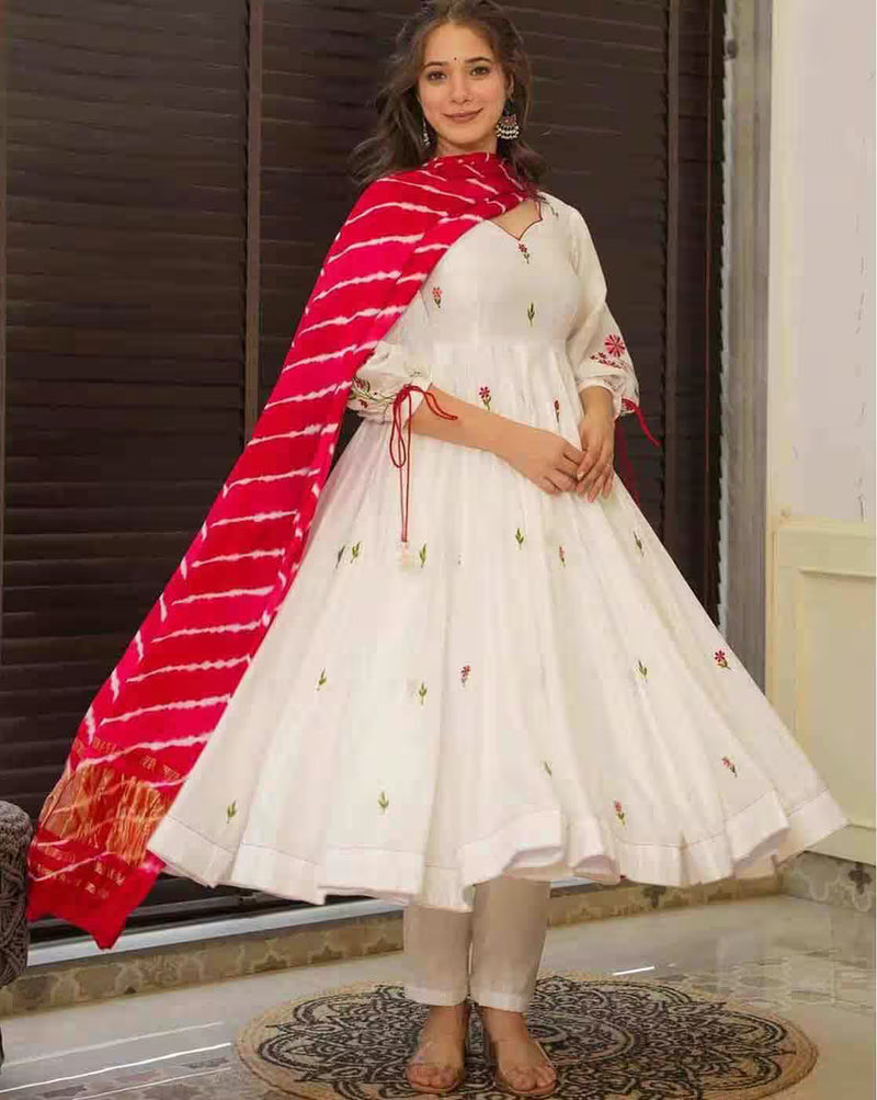Aromie white flared kurta with scattered floral motifs, beige churidar and red dupatta, floral cotton kurta set