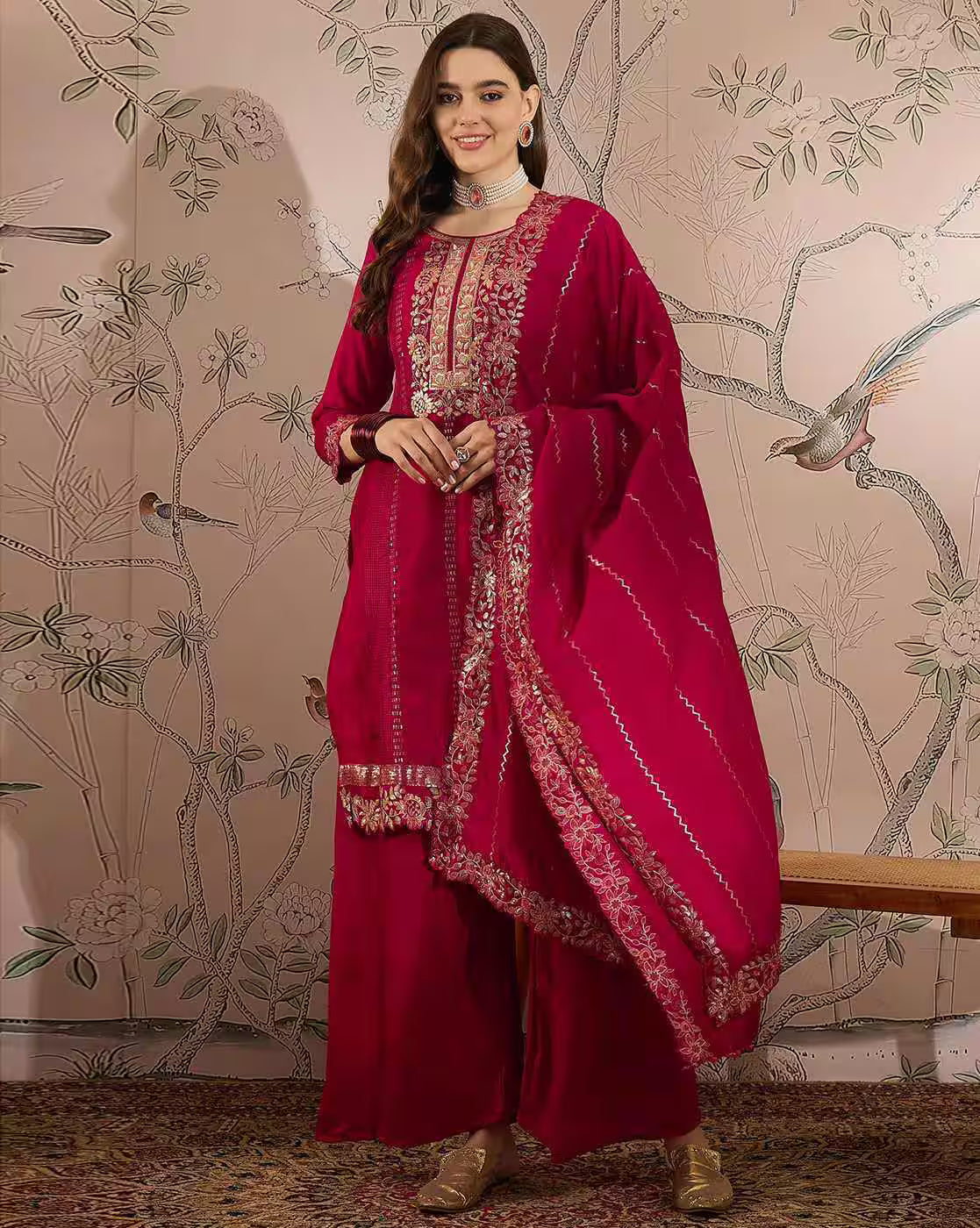 Aromie three piece kurtha in deep magenta with intricate embroidery on model not an elegant white kurta set