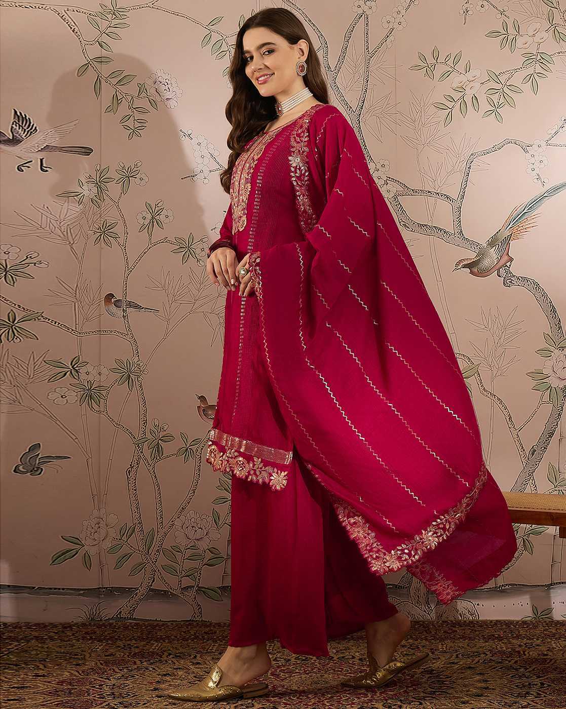 Aromie three piece maroon kurta set with gold embroidery worn by model and styled as an alternative to elegant white kurta set