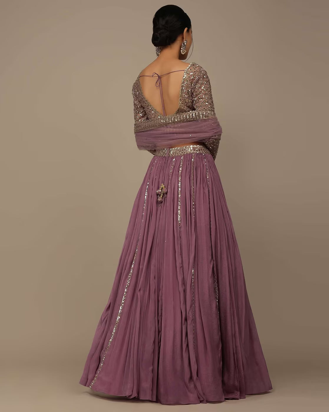 Back view of mauve embellished lehenga choli set Canada with sequined open back blouse draped dupatta