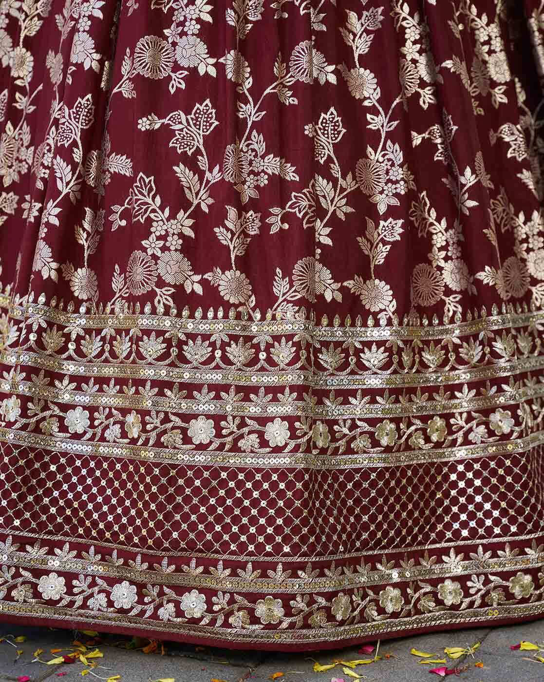 Maroon embroidered lehenga choli set Canada with gold floral embroidery and ornate border by AROMIE