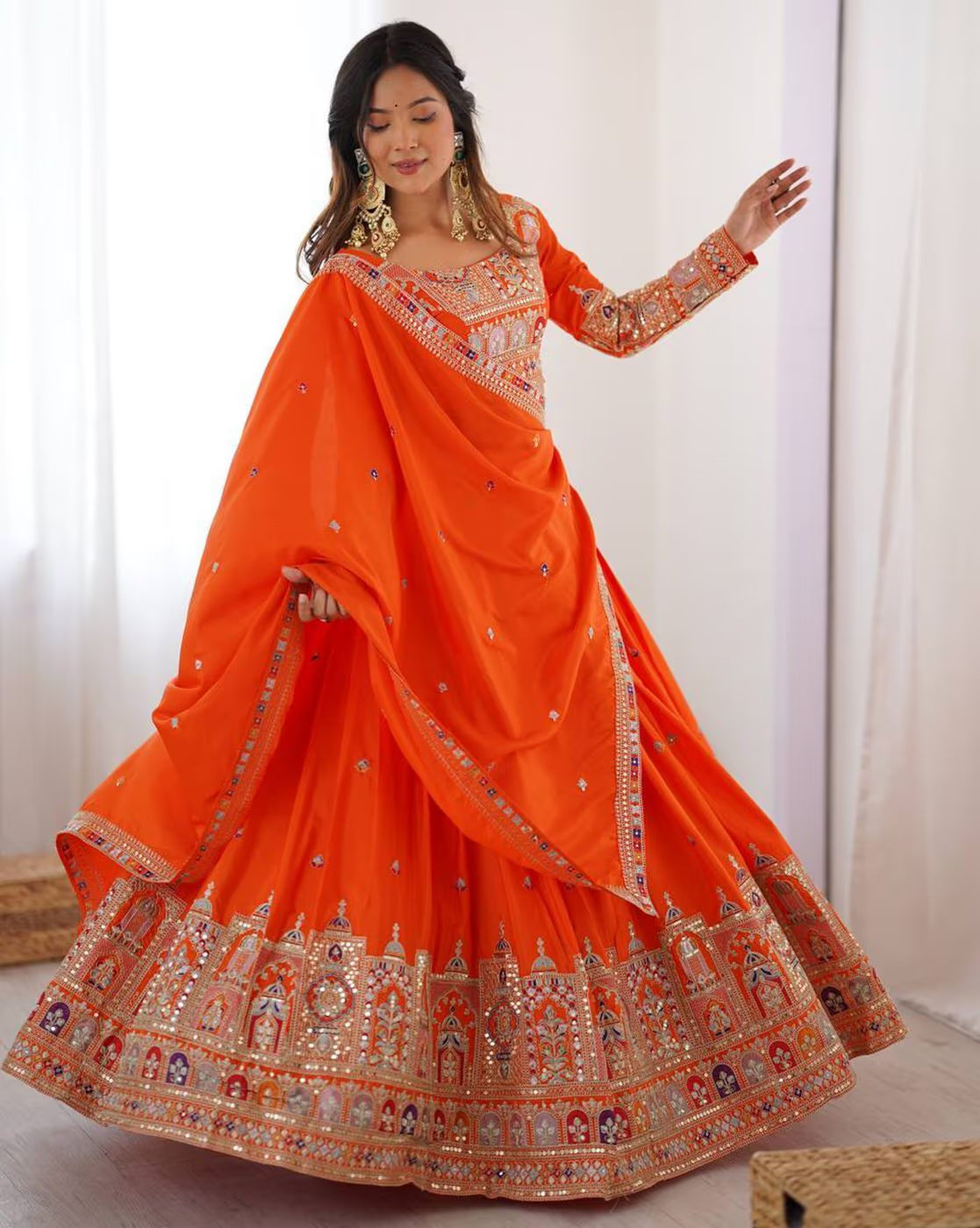 Bright orange embroidered lehenga choli set Canada with heavy gold border embroidery and matching dupatta