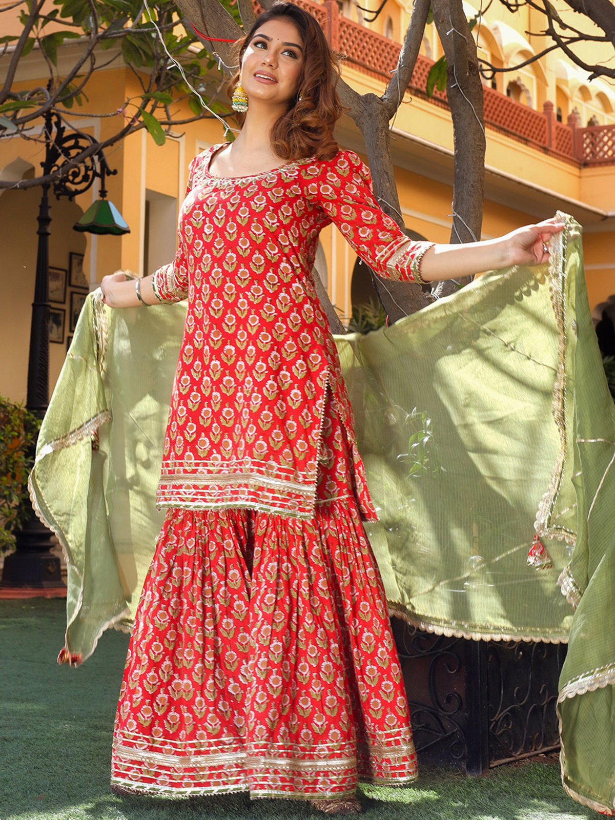 aromie Rayon Anarkali Kurta Set red printed three piece kurta with green dupatta gold embroidery floor length