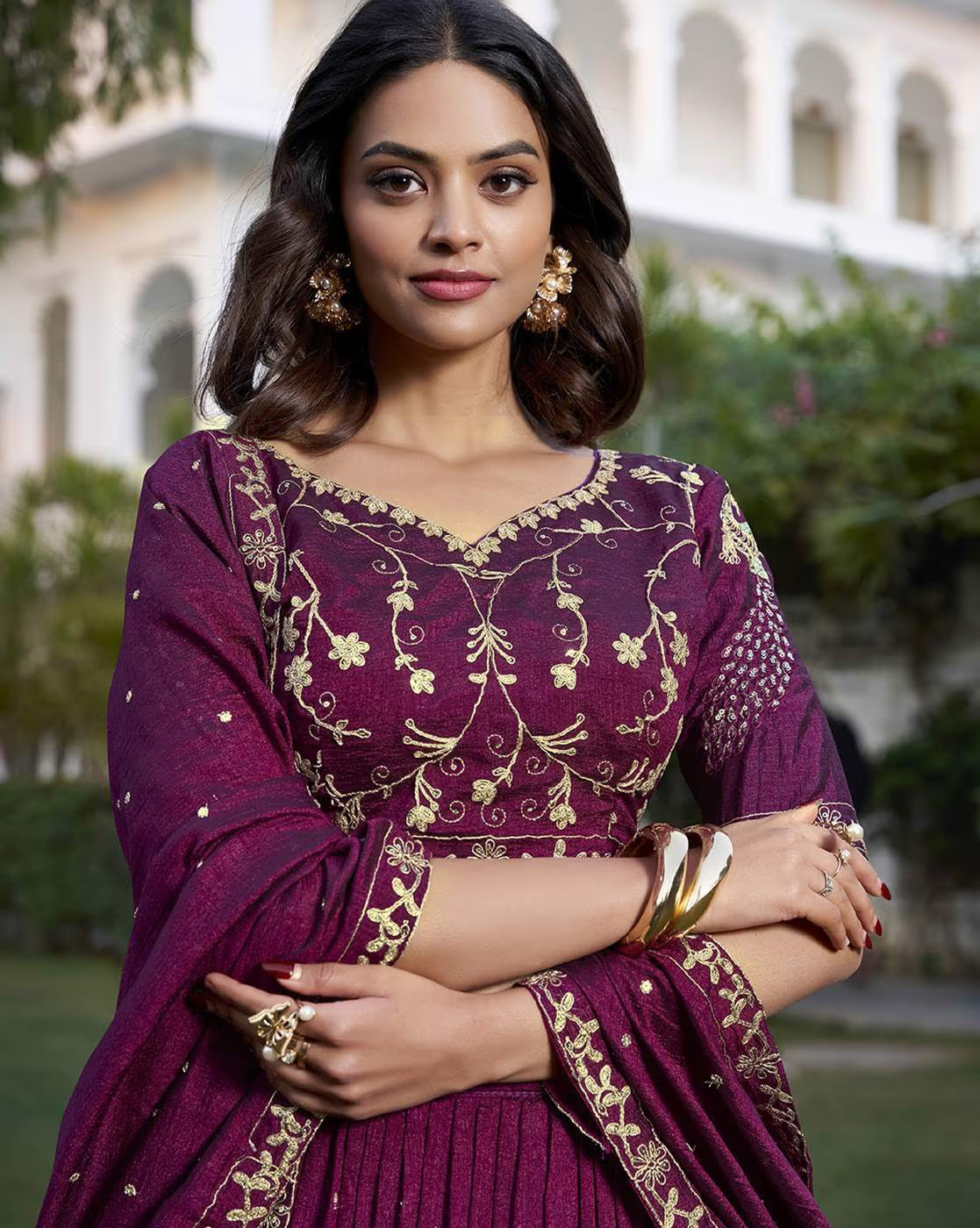 women's embroidered lehenga choli set in deep plum with gold zari embroidery v neck blouse pleated skirt and matching dupatta