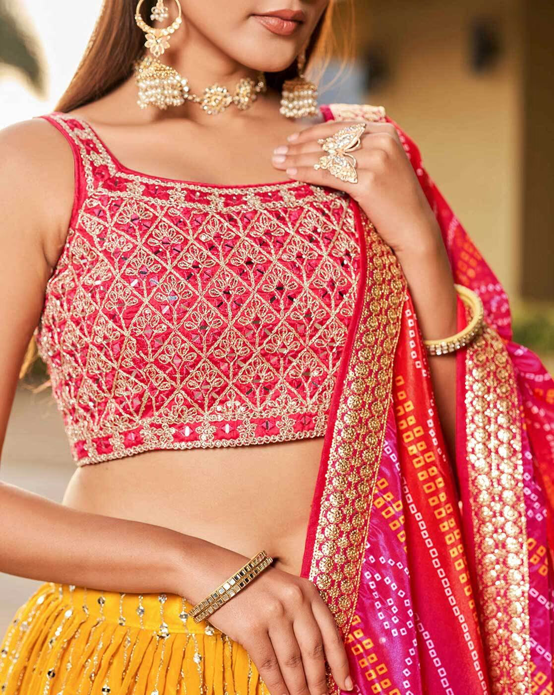 Pink embroidered choli with yellow skirt and bandhani dupatta with gold jewelry embroidered lehenga choli set Canada