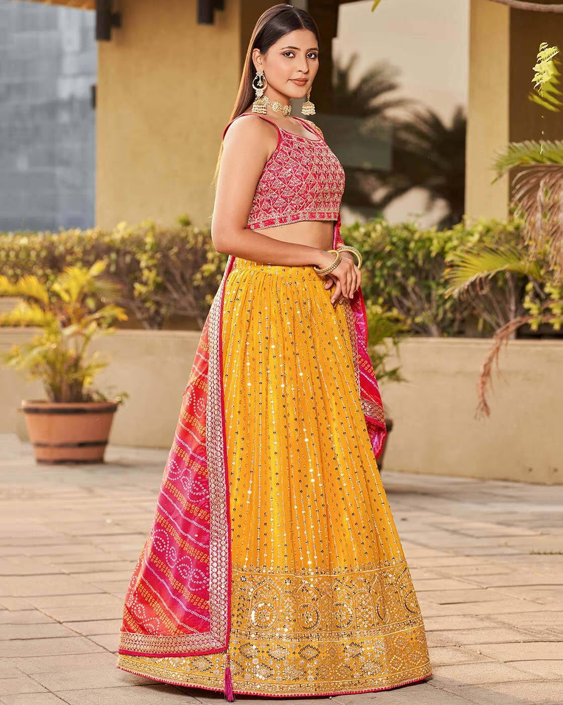 AROMIE yellow and pink embroidered lehenga choli set Canada with mirrorwork skirt and sleeveless brocade blouse
