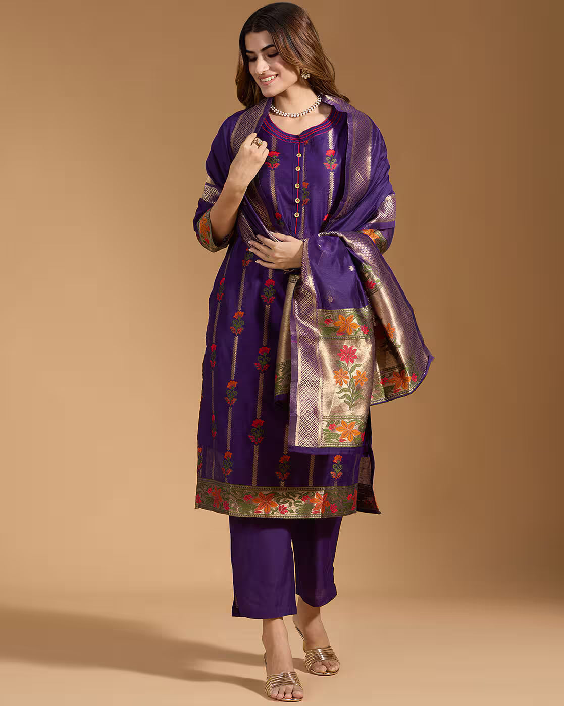 Aromie three piece teal floral kurta set styled in deep purple with floral embroidery and gold border dupatta