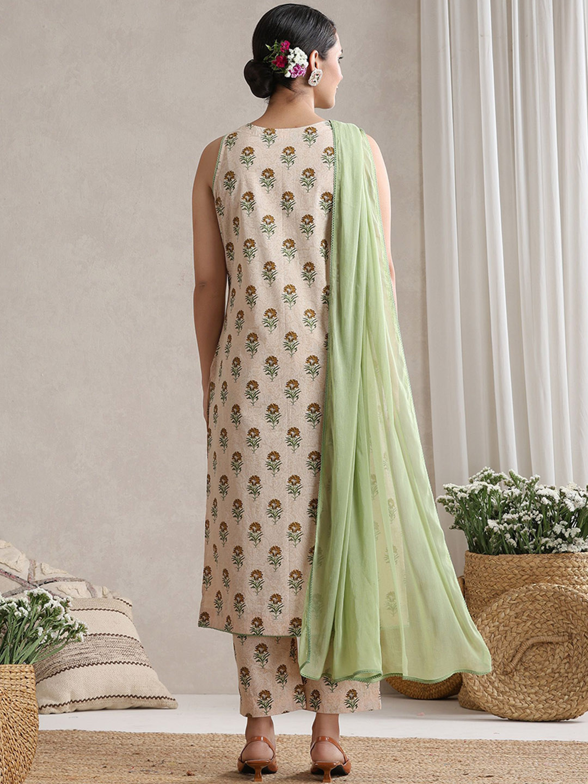 Back view of aromie three piece Kurtha with floral print and light green dupatta viscose embellished kurta set