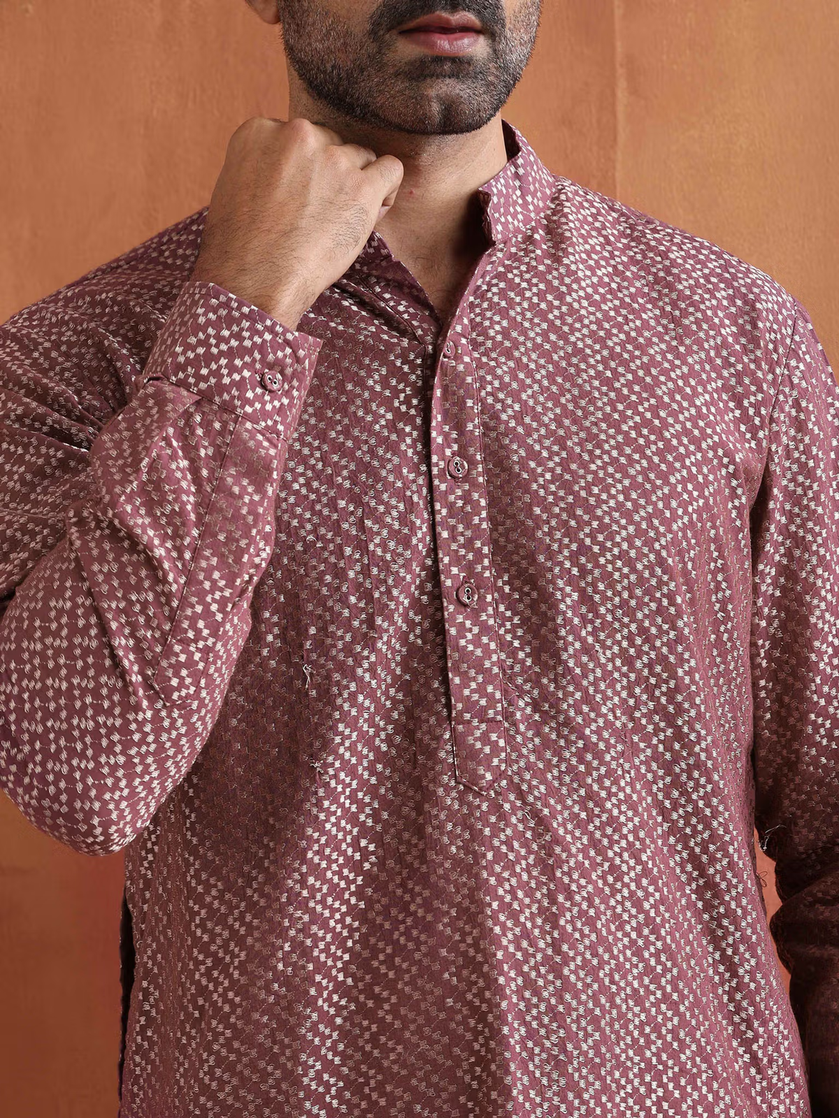 men's purple cotton kurta with small white geometric print with band collar and button placket on model