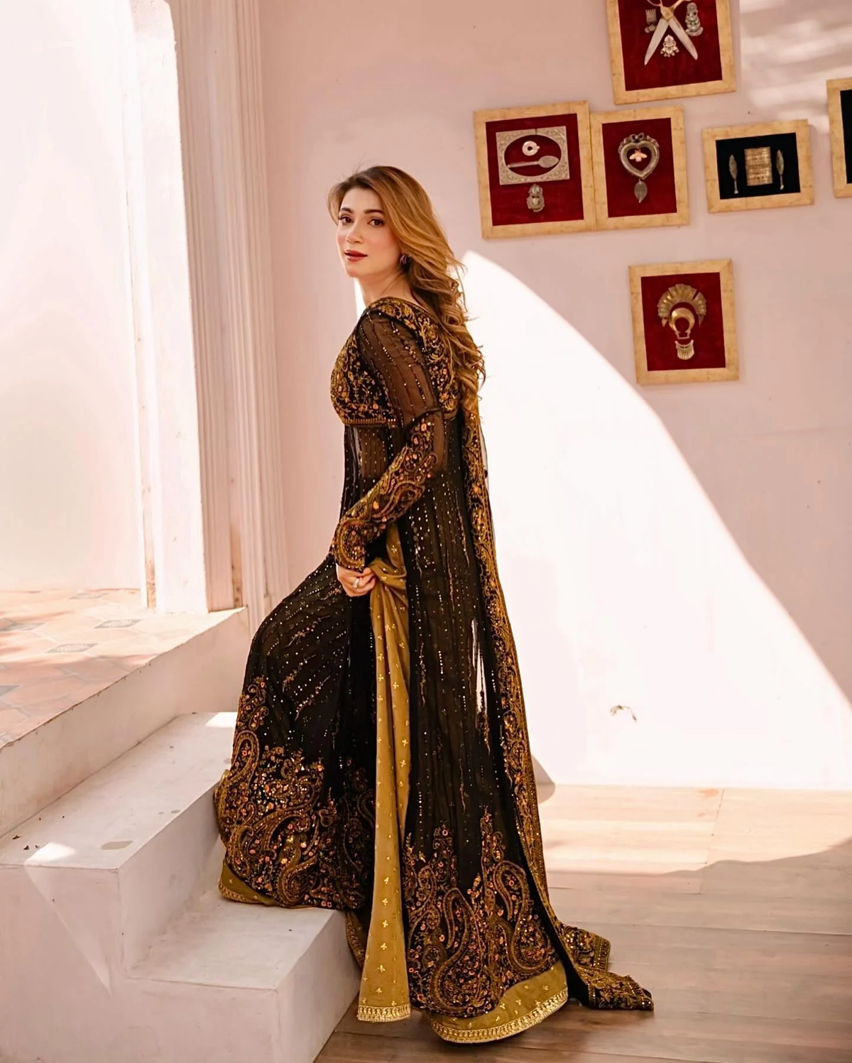 Elegant three piece Kurtha in black faux georgette palazzo set with dupatta, perfect for special occasions