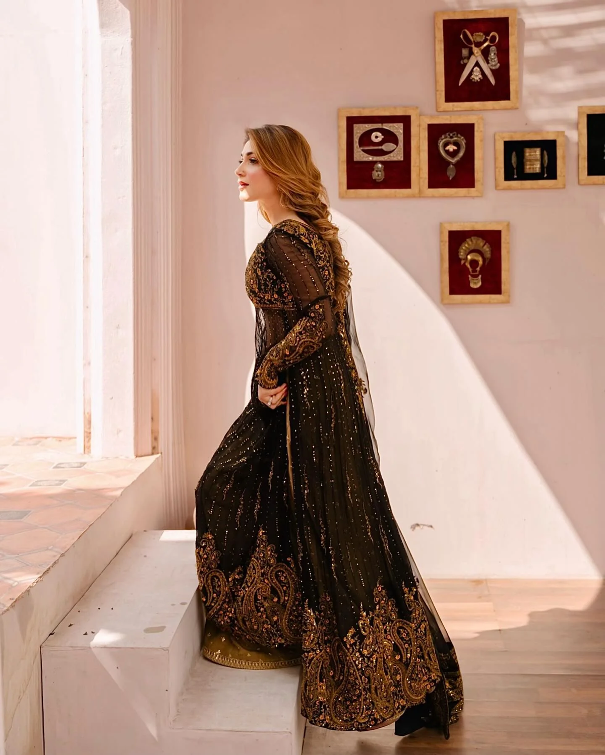 Three piece Kurtha in black faux georgette palazzo set with dupatta, elegantly designed for festive occasions.