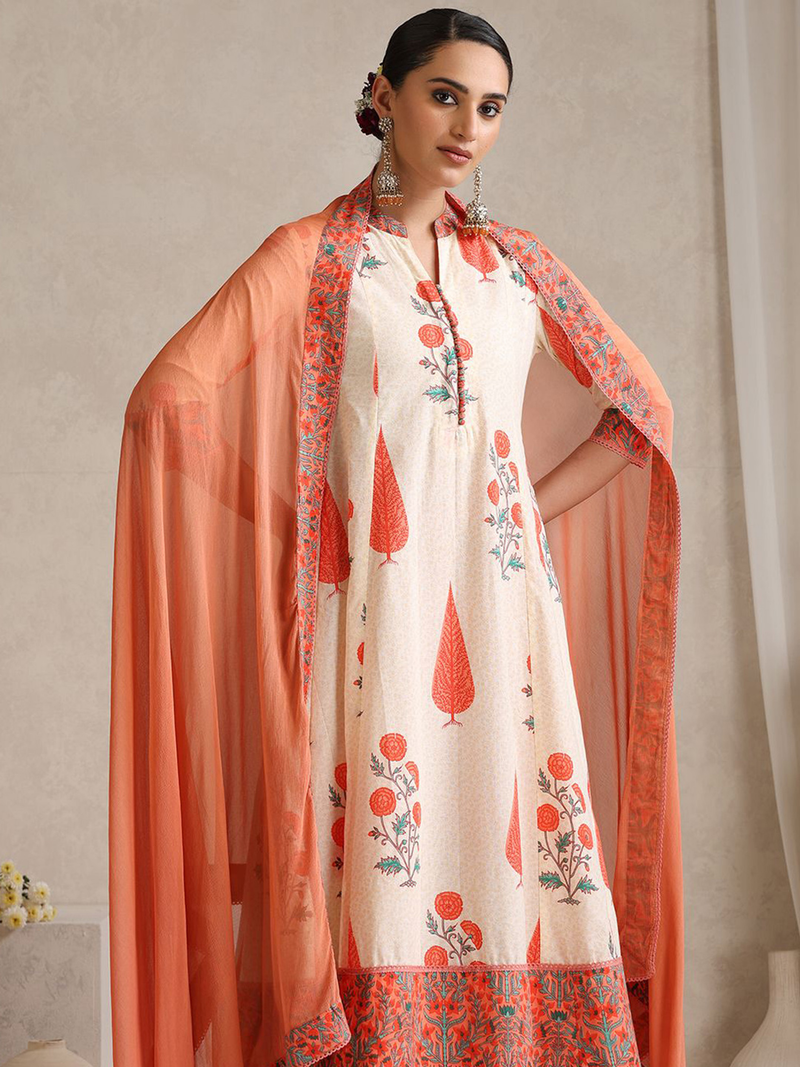 Three piece Kurtha in off-white with floral prints and an orange dupatta, perfect as a festive dress USA