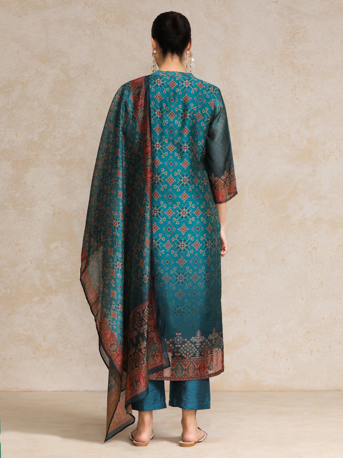 Elegant Floral Anarkali Kurta Set featuring intricate patterns and a flowing dupatta for a stylish look