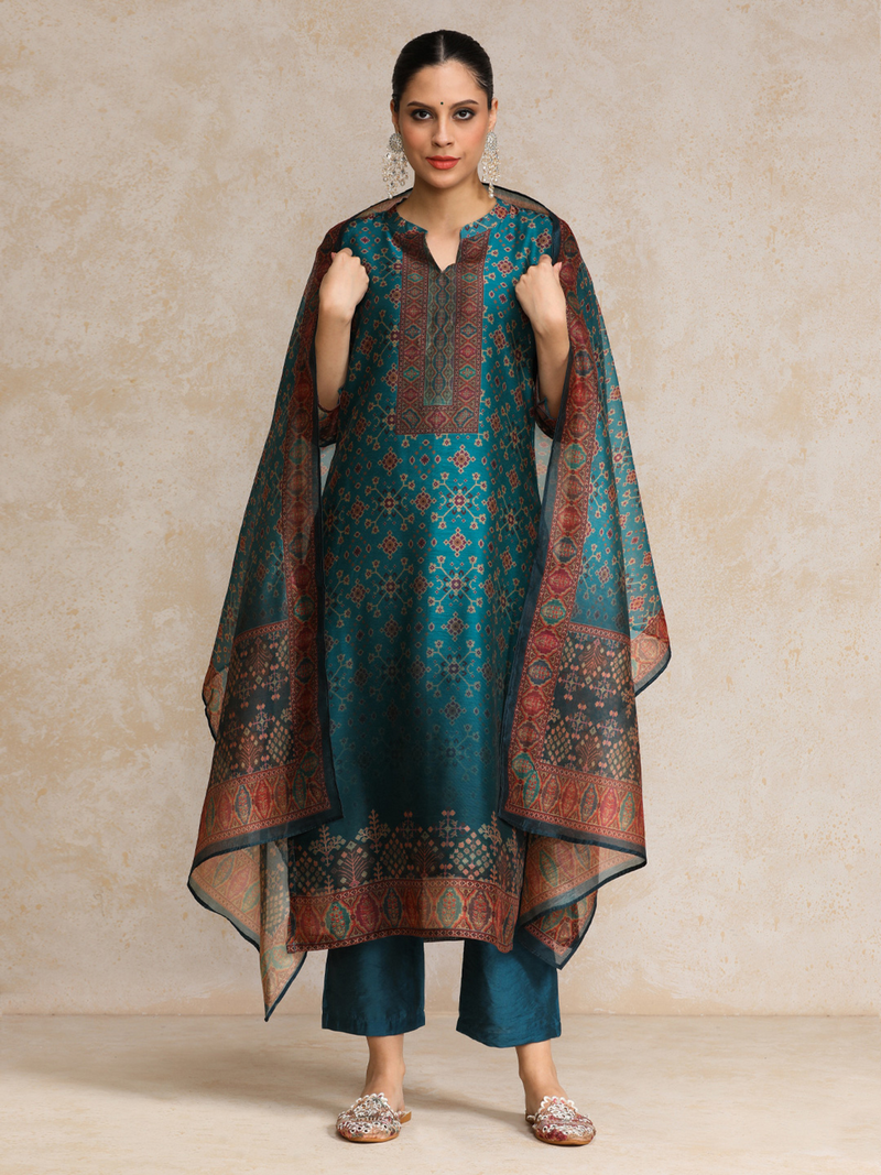 Aromie Floral Anarkali Kurta Set in teal with intricate patterns and matching dupatta for elegant occasions