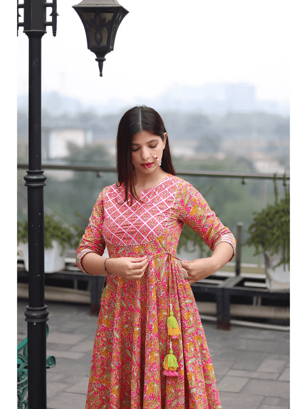 Floral Anarkali Kurta Set in vibrant pink with three pieces and stylish tassels
