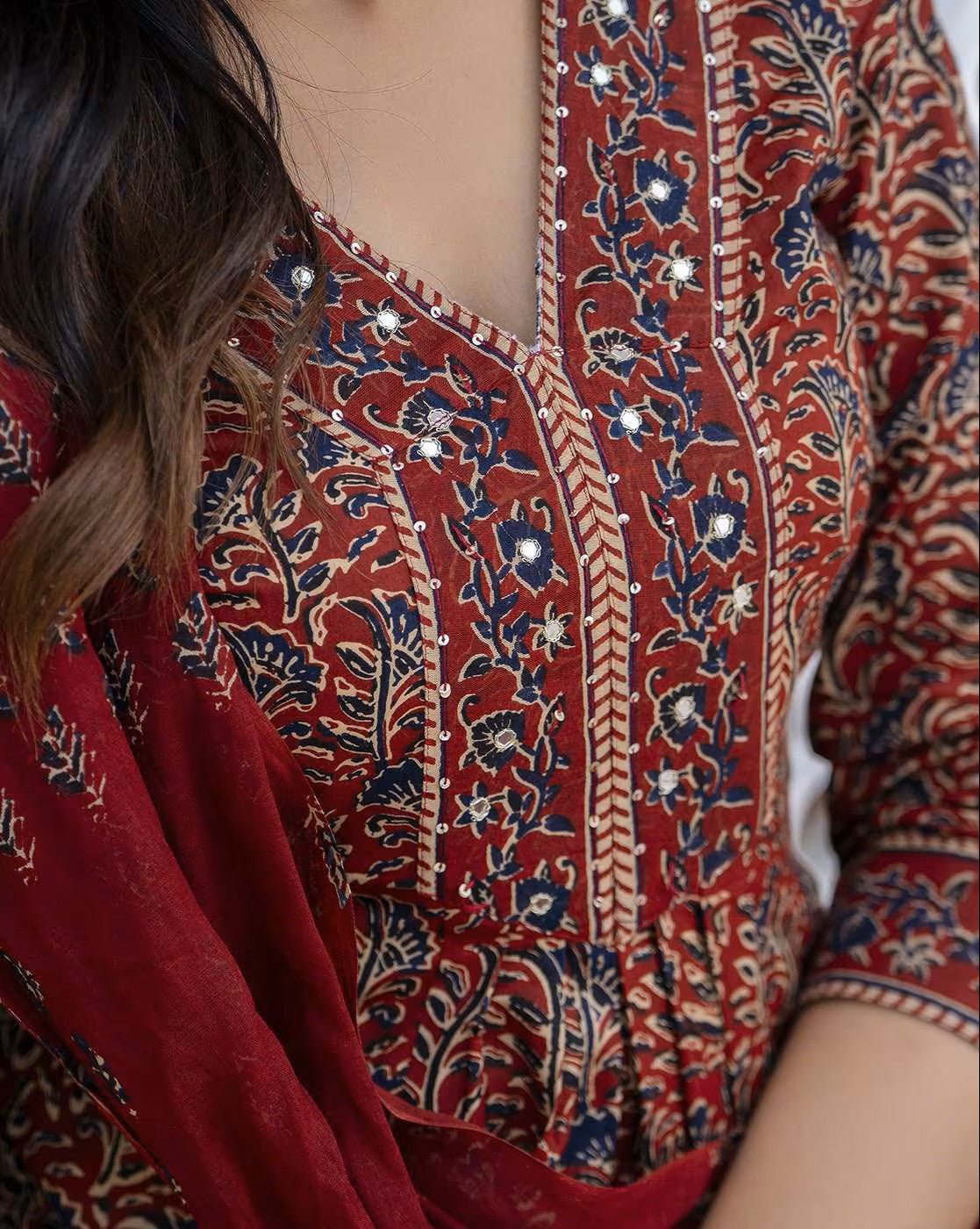 Floral cotton kurta set featuring intricate embroidery and a stylish design for elegant occasions