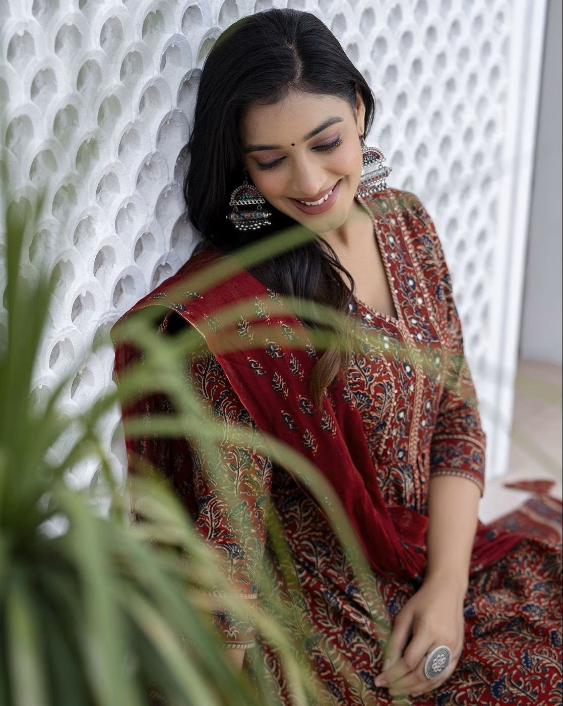 Elegant three piece floral cotton kurta set by Aromie with intricate patterns and a stylish design