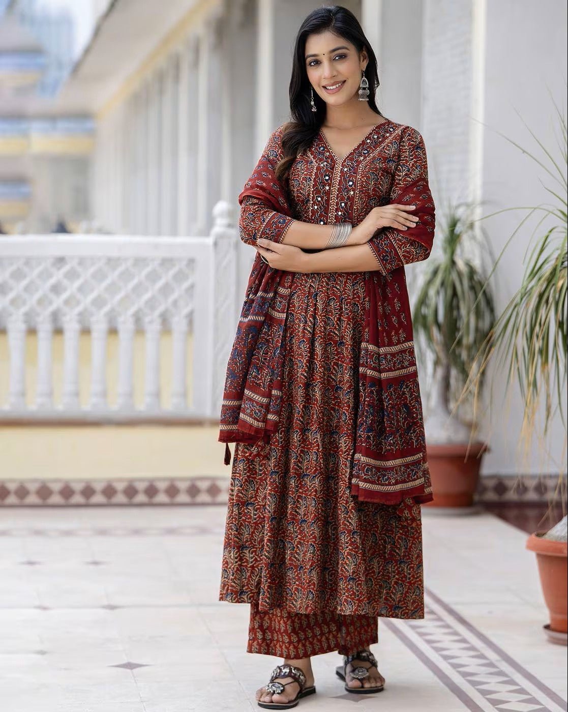 Elegant floral cotton kurta set with intricate patterns, paired with a matching dupatta for a stylish look