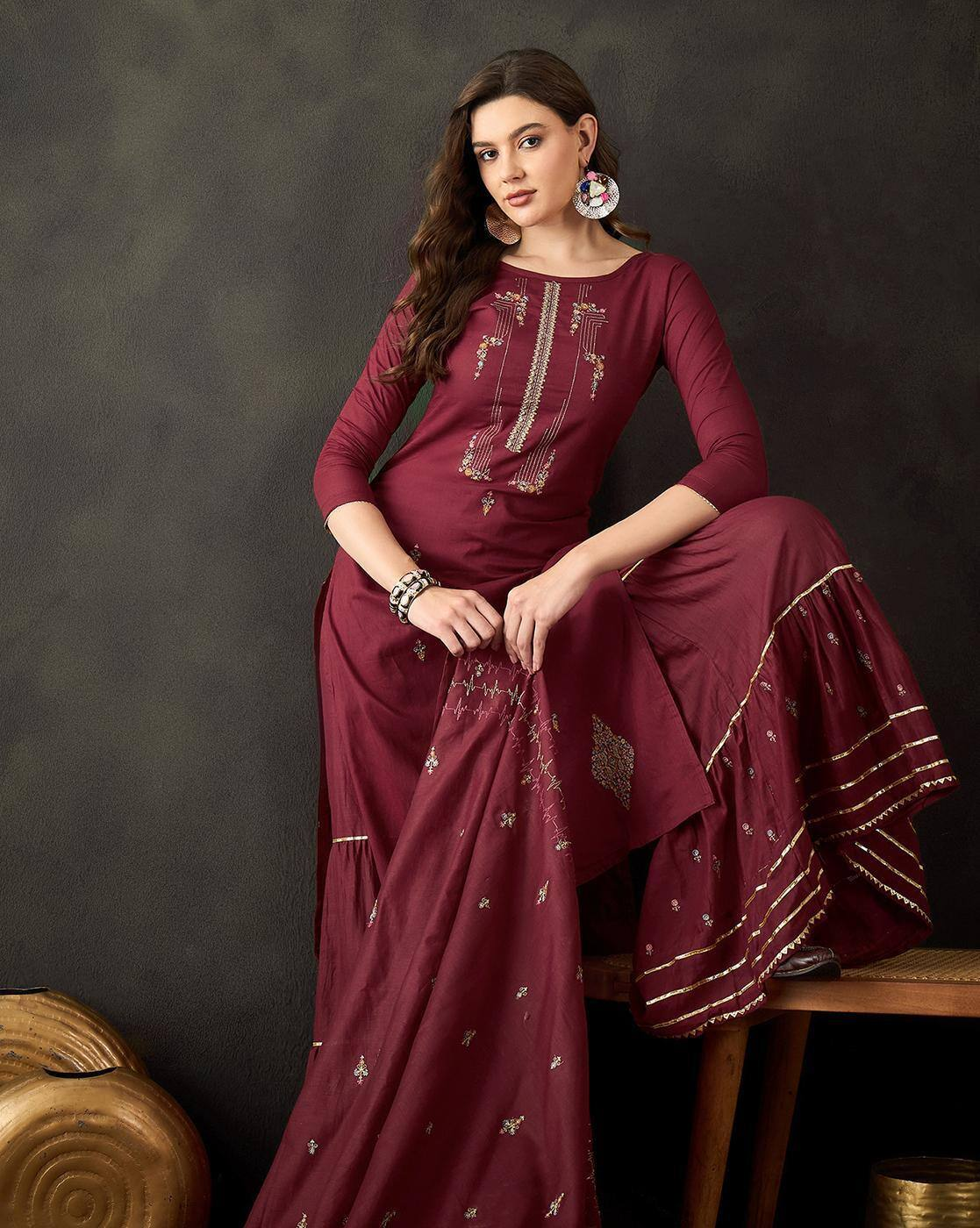 Aromie three piece floral embroidered cotton kurta set in deep maroon with intricate gold detailing