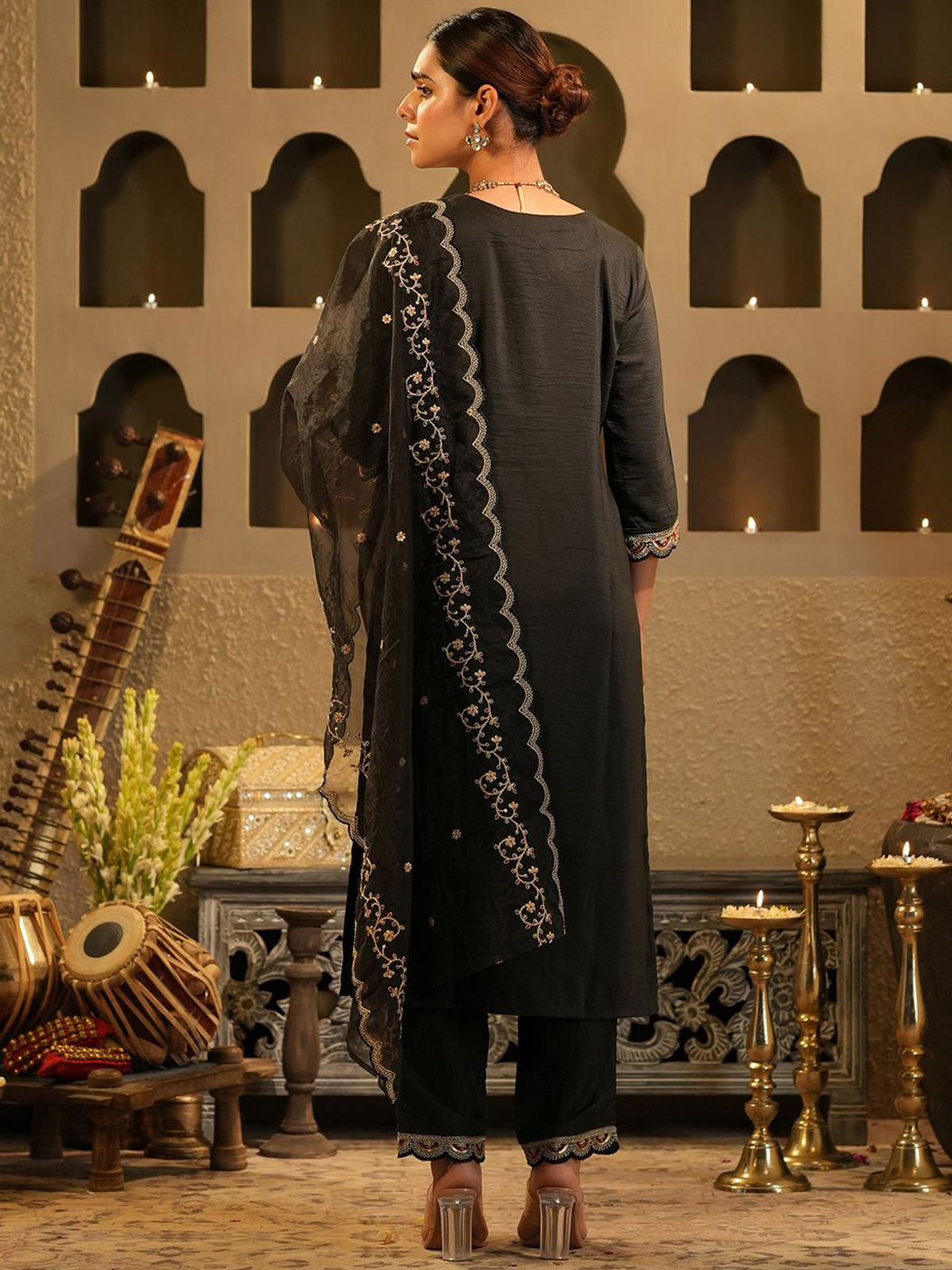 Elegant three piece floral embroidered kurta set with a black dupatta and tailored pants