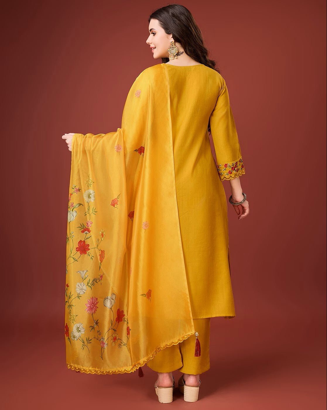Beautiful floral embroidered kurta set in yellow with elegant embroidery details and matching dupatta